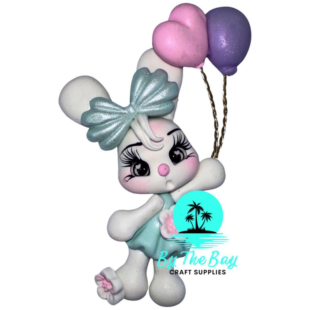 White bunny with balloons