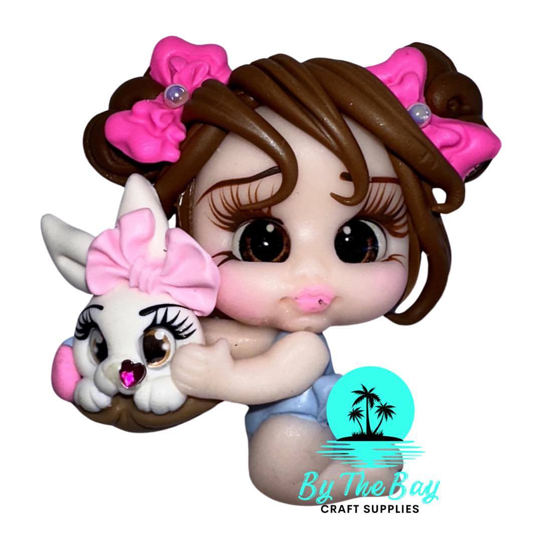 Brown hair girl with white bunny pink bow