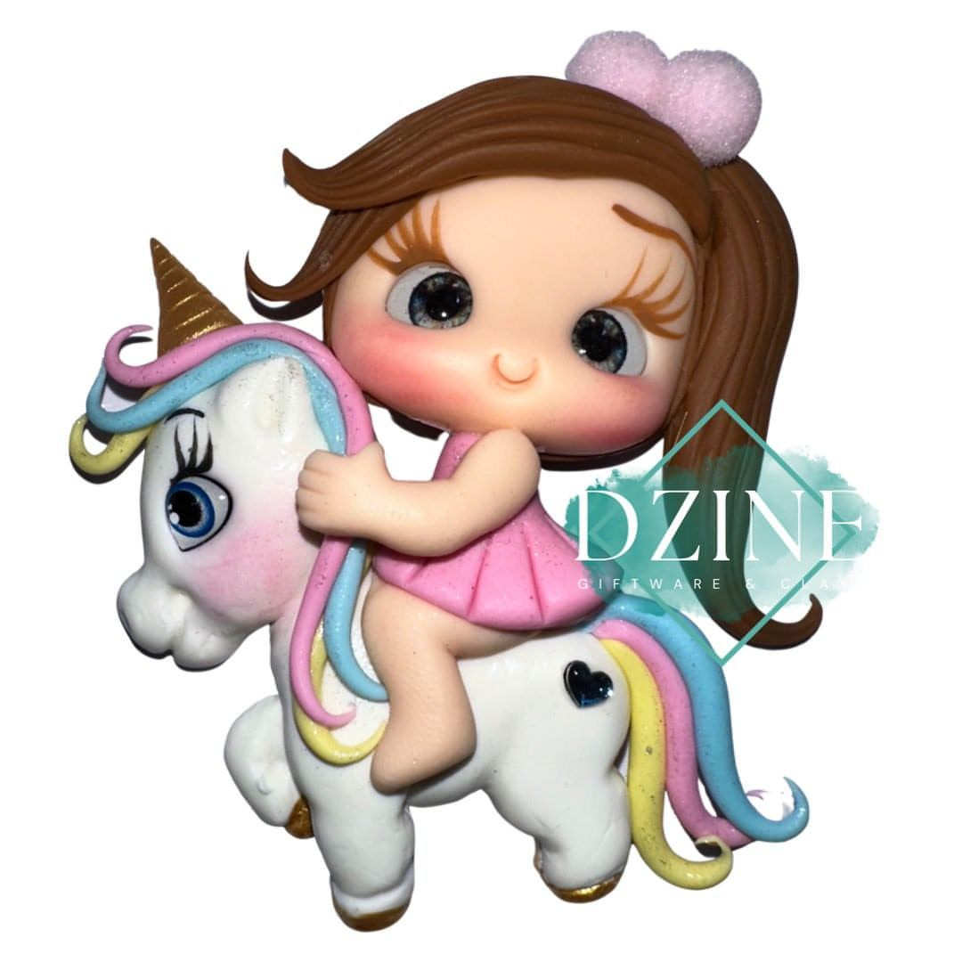 Cute girl on unicorn with pom pom