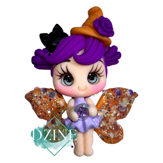 Halloween fairy with orange glow wings